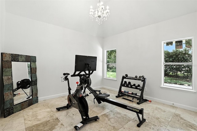 2890 Wild Ginger Ct, Winter Park, FL 32792 - exercise area with a chandelier and baseboards