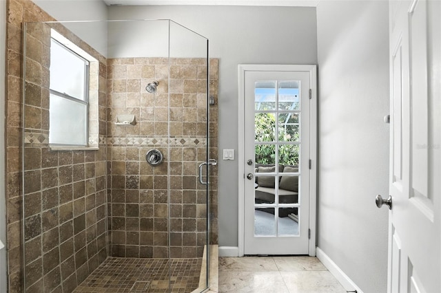 2890 Wild Ginger Ct, Winter Park, FL 32792 - full bathroom with a shower stall and baseboards