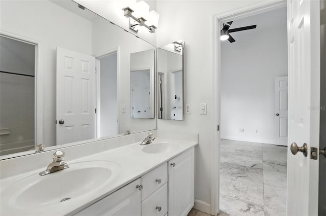 2890 Wild Ginger Ct, Winter Park, FL 32792 - bathroom with double vanity, marble look tiles, and ceiling fan