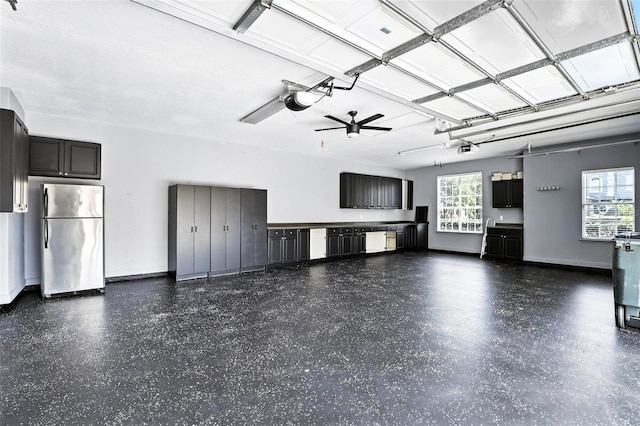 2890 Wild Ginger Ct, Winter Park, FL 32792 - garage featuring freestanding refrigerator, a garage door opener, and ceiling fan