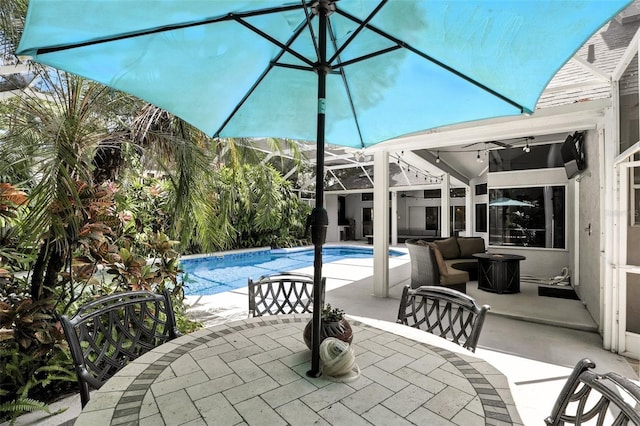 2890 Wild Ginger Ct, Winter Park, FL 32792 - swimming pool featuring outdoor dining space, a ceiling fan, and a patio area