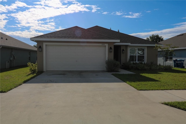 1105 Citrus Landings Blvd, Davenport, FL 33837 - ranch-style home featuring stucco siding, an attached garage, a front lawn, and driveway