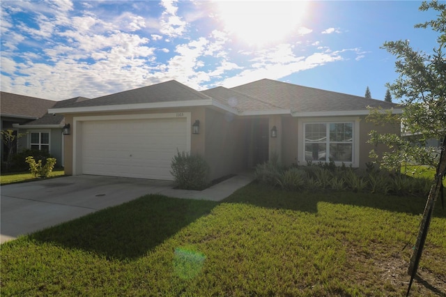 1105 Citrus Landings Blvd, Davenport, FL 33837 - ranch-style home with stucco siding, a garage, a front lawn, and driveway