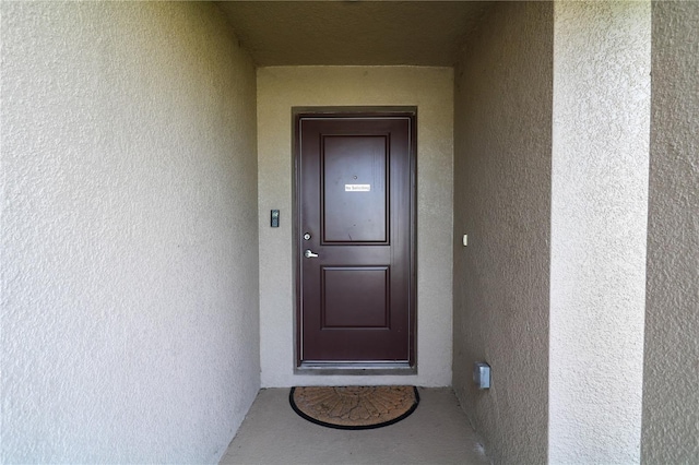 1105 Citrus Landings Blvd, Davenport, FL 33837 - entrance to property featuring stucco siding