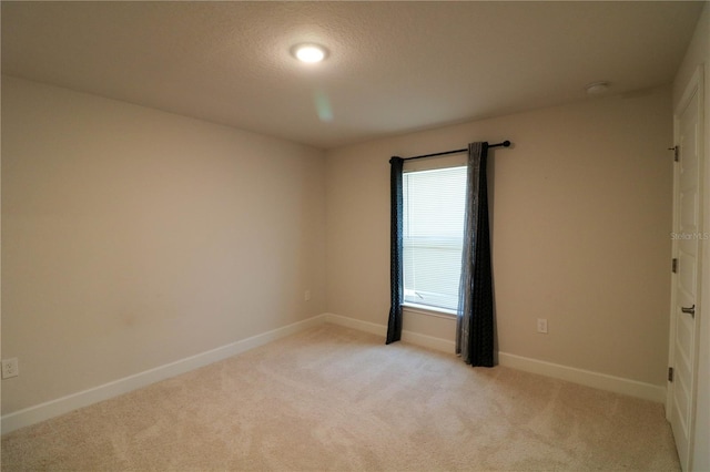 1105 Citrus Landings Blvd, Davenport, FL 33837 - spare room with light colored carpet and a textured ceiling