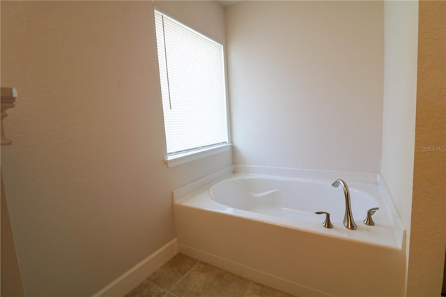 1105 Citrus Landings Blvd, Davenport, FL 33837 - full bathroom with a bath and tile patterned flooring