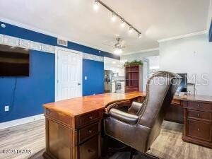 2055 S Atlantic Ave Unit 505, Daytona Beach, FL 32118 - office with a ceiling fan, rail lighting, and wood finished floors
