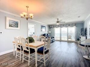 2055 S Atlantic Ave Unit 505, Daytona Beach, FL 32118 - dining area featuring a chandelier, ornamental molding, wood finished floors, and ceiling fan