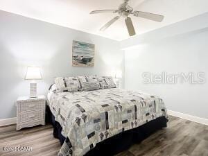 2055 S Atlantic Ave Unit 505, Daytona Beach, FL 32118 - bedroom featuring wood finished floors and ceiling fan