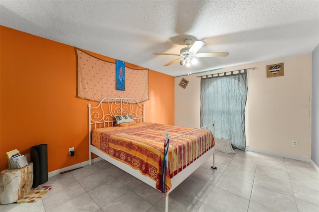 2309 Cilantro Dr, Orlando, FL 32837 - bedroom featuring a textured ceiling, a ceiling fan, and tile patterned flooring