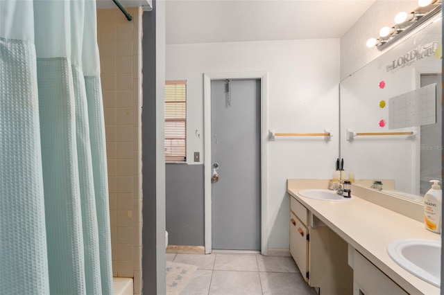 2309 Cilantro Dr, Orlando, FL 32837 - bathroom with double vanity, tile patterned flooring, and shower / tub combo