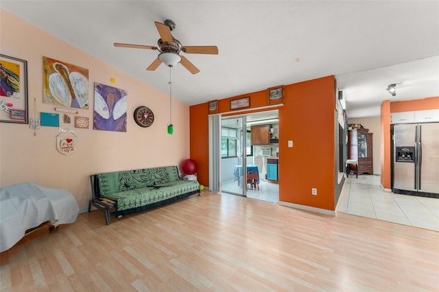 2309 Cilantro Dr, Orlando, FL 32837 - living room with a ceiling fan and light wood-style flooring