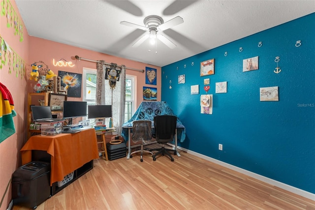 2309 Cilantro Dr, Orlando, FL 32837 - office featuring a ceiling fan, wood finished floors, and an accent wall