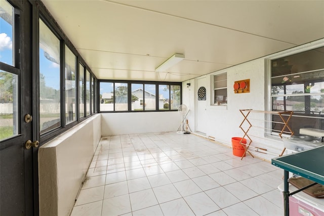 2309 Cilantro Dr, Orlando, FL 32837 - unfurnished sunroom with tile patterned flooring