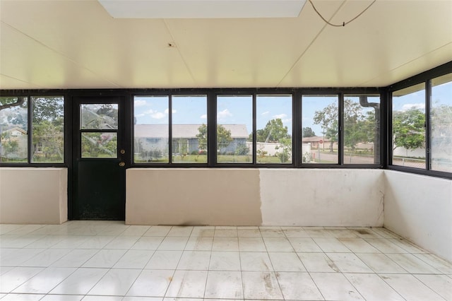 2309 Cilantro Dr, Orlando, FL 32837 - unfurnished sunroom with tile patterned floors
