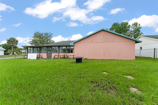 2309 Cilantro Dr, Orlando, FL 32837 - rear view of house featuring a sunroom
