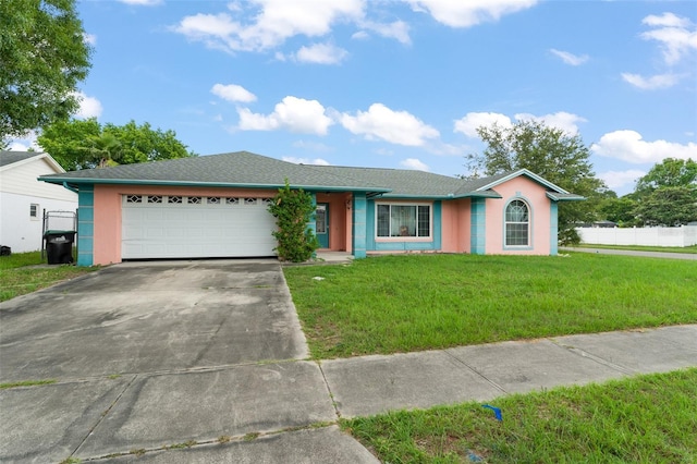 2309 Cilantro Dr, Orlando, FL 32837 - ranch-style house featuring an attached garage, driveway, stucco siding, and roof with shingles