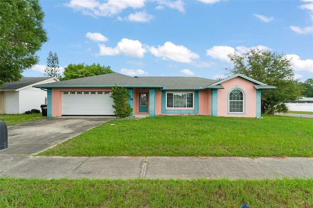 2309 Cilantro Dr, Orlando, FL 32837 - single story home featuring an attached garage, stucco siding, driveway, and a front lawn