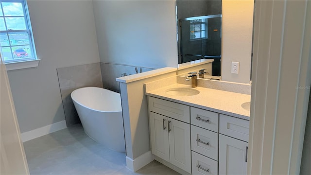 2579 SW 146th St, Ocala, FL 34473 - bathroom with double vanity, a soaking tub, and a stall shower