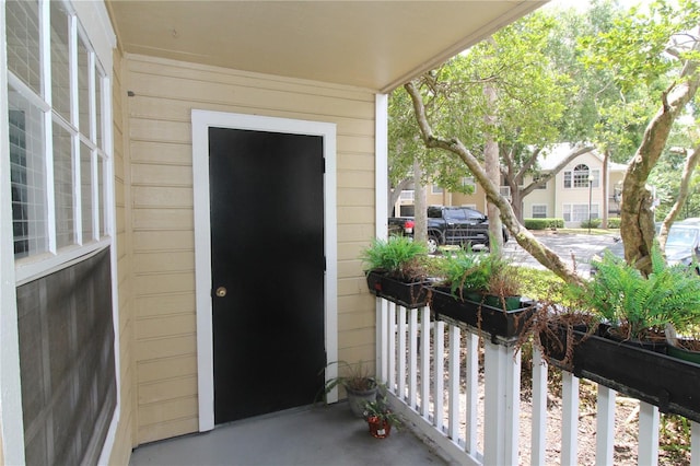 1019 S Hiawassee Rd Unit 3811, Orlando, FL 32835 - doorway to property with covered porch