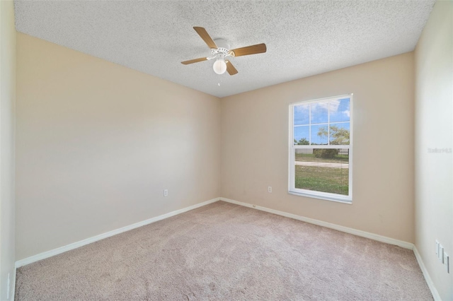 3313 Buckland St, Deltona, FL 32738 - carpeted empty room featuring a ceiling fan and a textured ceiling