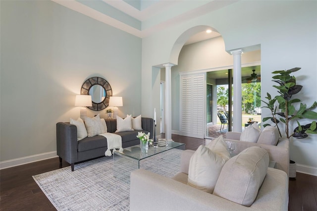 3531 Oriskany Dr, Orlando, FL 32820 - living room with decorative columns, arched walkways, and wood finished floors
