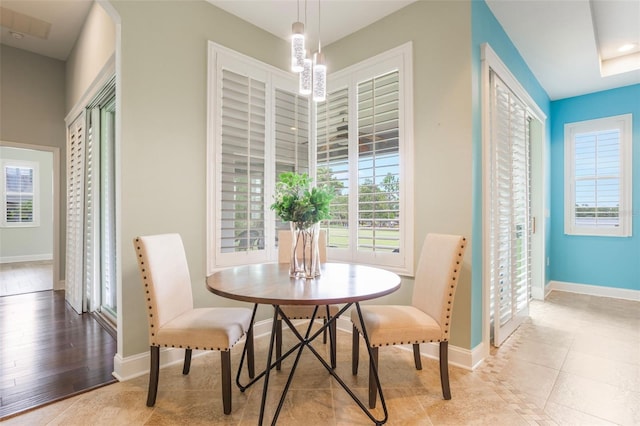 3531 Oriskany Dr, Orlando, FL 32820 - dining room featuring a chandelier and baseboards