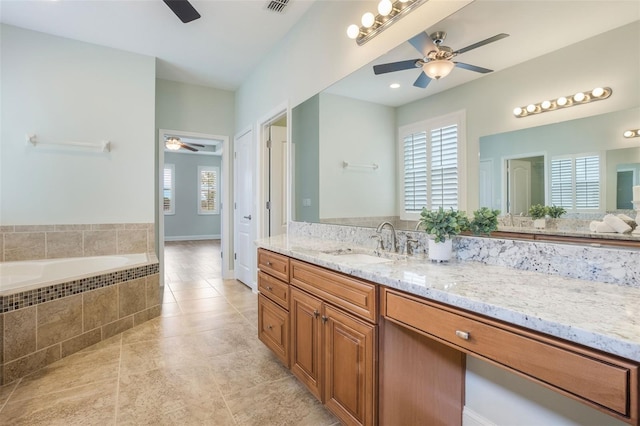3531 Oriskany Dr, Orlando, FL 32820 - full bathroom with a ceiling fan, a bath, and vanity