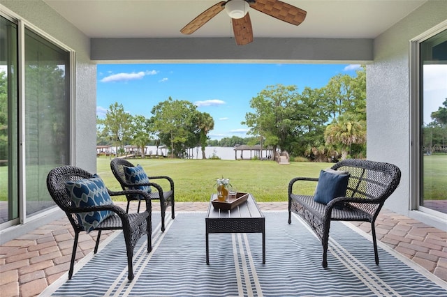 3531 Oriskany Dr, Orlando, FL 32820 - view of patio featuring ceiling fan and a water view