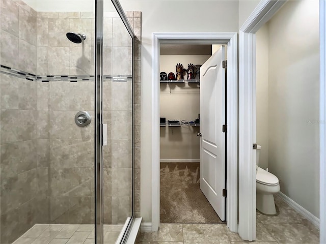 14654 Yellow Butterfly Rd, Windermere, FL 34786 - bathroom featuring a shower stall and a walk in closet