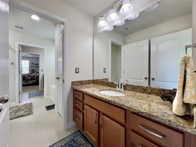 14654 Yellow Butterfly Rd, Windermere, FL 34786 - bathroom with vanity and tile patterned flooring