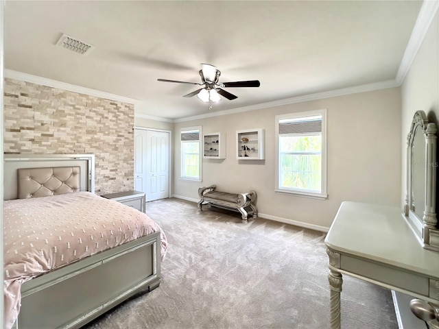 14654 Yellow Butterfly Rd, Windermere, FL 34786 - carpeted bedroom featuring multiple windows, a closet, crown molding, and a ceiling fan