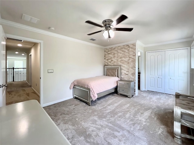 14654 Yellow Butterfly Rd, Windermere, FL 34786 - carpeted bedroom featuring ornamental molding, ceiling fan, and a closet