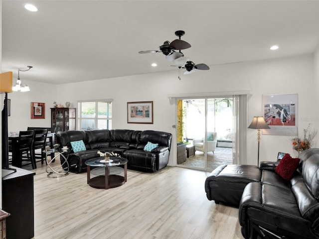 12347 NE 52nd Loop, Oxford, FL 34484 - living room featuring wood finished floors, ceiling fan, recessed lighting, and a chandelier