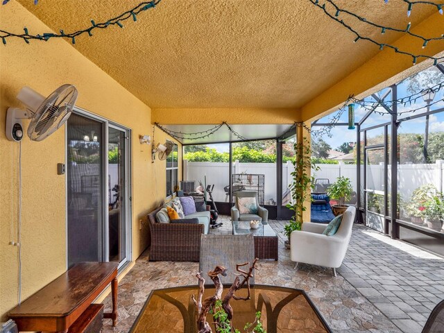 12347 NE 52nd Loop, Oxford, FL 34484 - sunroom / solarium featuring an outdoor living space