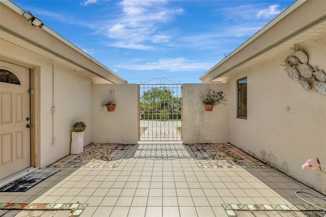 1701 Bayshore Dr, Hutchinson Island, FL 34949 - view of patio featuring a gate