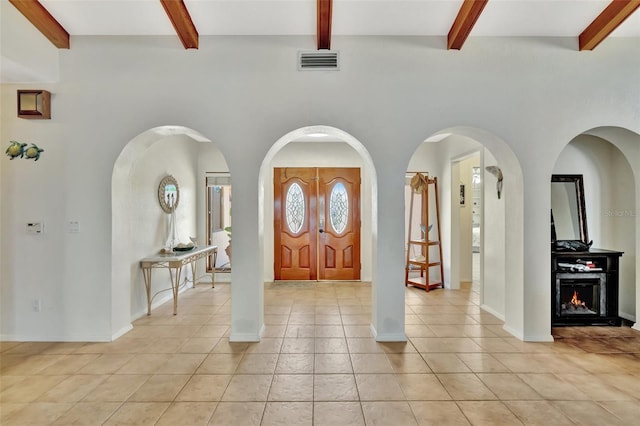 1701 Bayshore Dr, Hutchinson Island, FL 34949 - entryway featuring beamed ceiling and light tile patterned floors