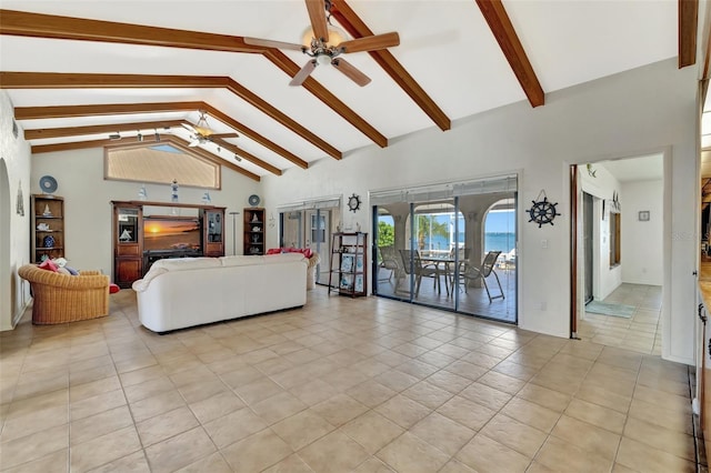 1701 Bayshore Dr, Hutchinson Island, FL 34949 - living room featuring a ceiling fan, high vaulted ceiling, beamed ceiling, and light tile patterned floors