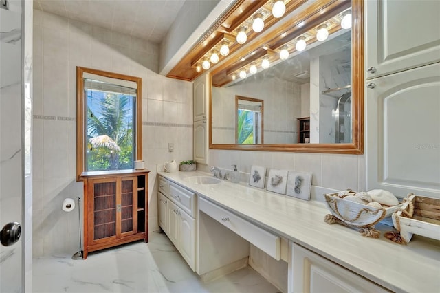 1701 Bayshore Dr, Hutchinson Island, FL 34949 - bathroom featuring vanity and marble finish flooring