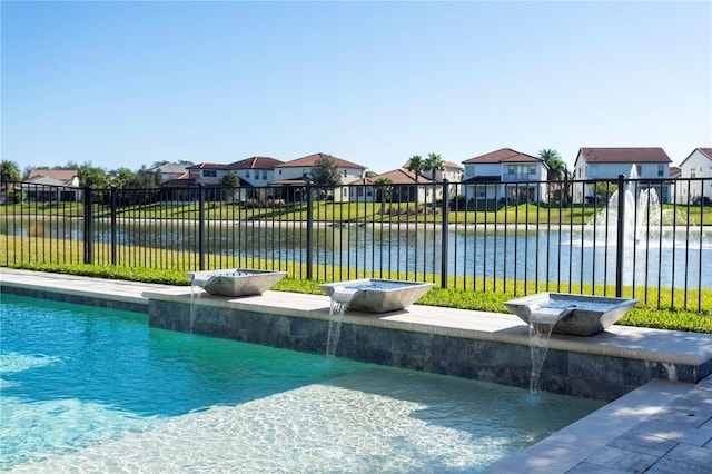 10427 Royal Cypress Way, Orlando, FL 32836 - view of swimming pool with a residential view and a water view