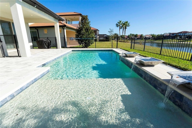 10427 Royal Cypress Way, Orlando, FL 32836 - view of pool featuring a patio, a fenced backyard, and a water view