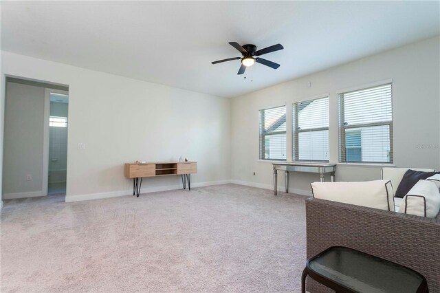 10427 Royal Cypress Way, Orlando, FL 32836 - sitting room featuring ceiling fan and carpet