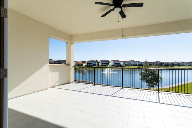 10427 Royal Cypress Way, Orlando, FL 32836 - patio / terrace featuring a water view, a ceiling fan, and a residential view