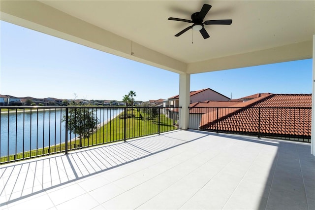 10427 Royal Cypress Way, Orlando, FL 32836 - patio / terrace with a water view, ceiling fan, and a residential view