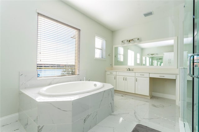 10427 Royal Cypress Way, Orlando, FL 32836 - bathroom featuring a garden tub, vanity, marble finish flooring, and an enclosed shower