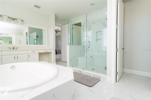 10427 Royal Cypress Way, Orlando, FL 32836 - bathroom featuring a marble finish shower, a garden tub, vanity, and marble finish flooring