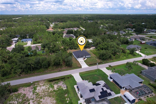4447 Heyward St, North Port, FL 34291 - aerial perspective of suburban area with a heavily wooded area