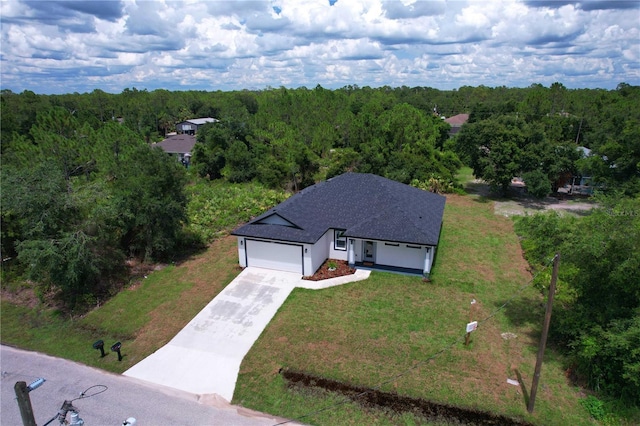 4447 Heyward St, North Port, FL 34291 - aerial view of property and surrounding area with a forest