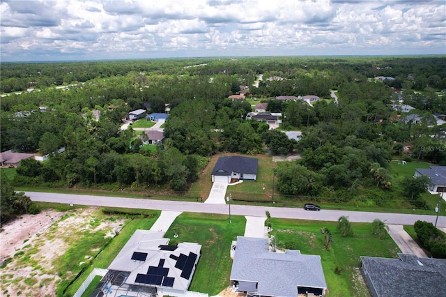 4447 Heyward St, North Port, FL 34291 - aerial view of property and surrounding area featuring a forest and nearby suburban area