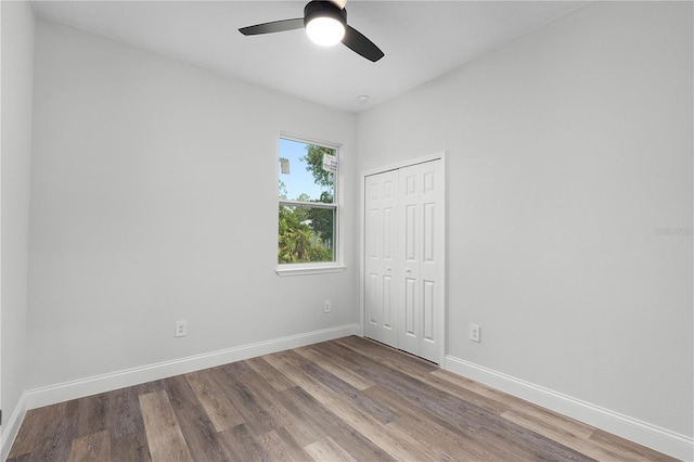 4447 Heyward St, North Port, FL 34291 - unfurnished bedroom with wood finished floors, a closet, and ceiling fan